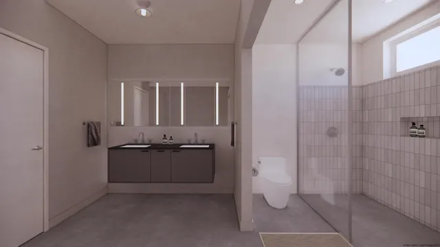 a bathroom with a granite countertop sink a toilet and shower
