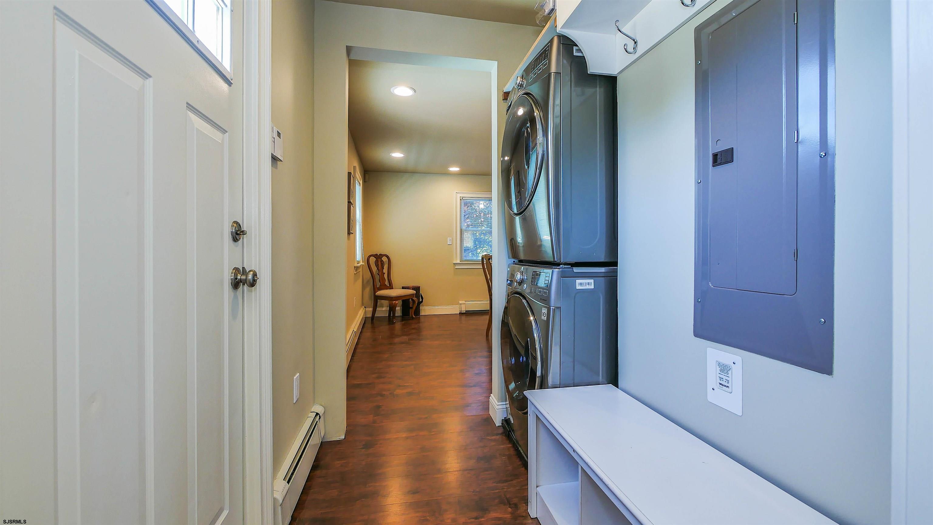 810 East Moss Mill Road Leeds Point, NJ 08205 - Photo 15 of 36 a hallway with a washer and dryer