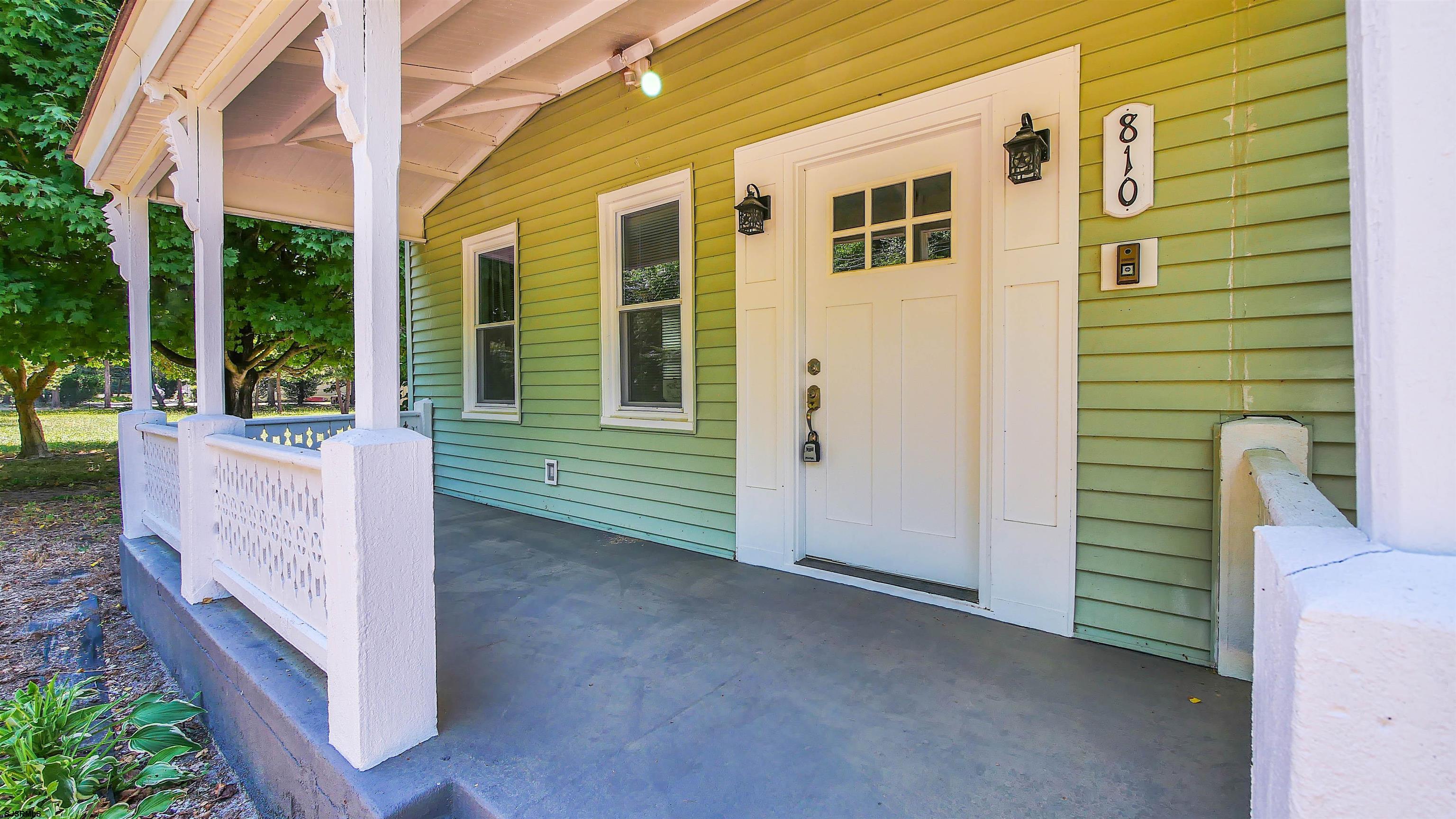810 East Moss Mill Road Leeds Point, NJ 08205 - Photo 2 of 36 a view of a house with backyard and porch