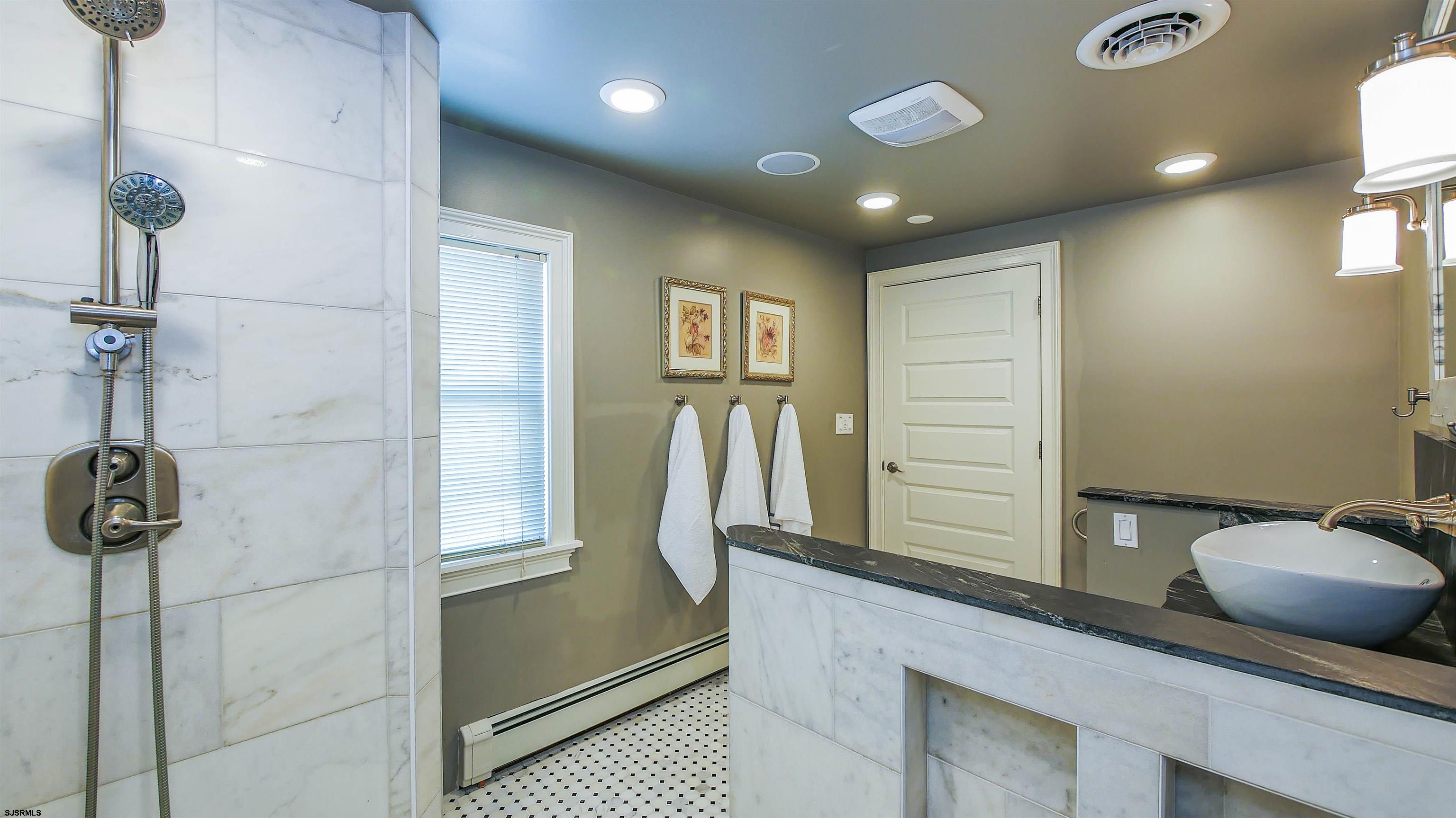 810 East Moss Mill Road Leeds Point, NJ 08205 - Photo 25 of 36 a bathroom with a shower