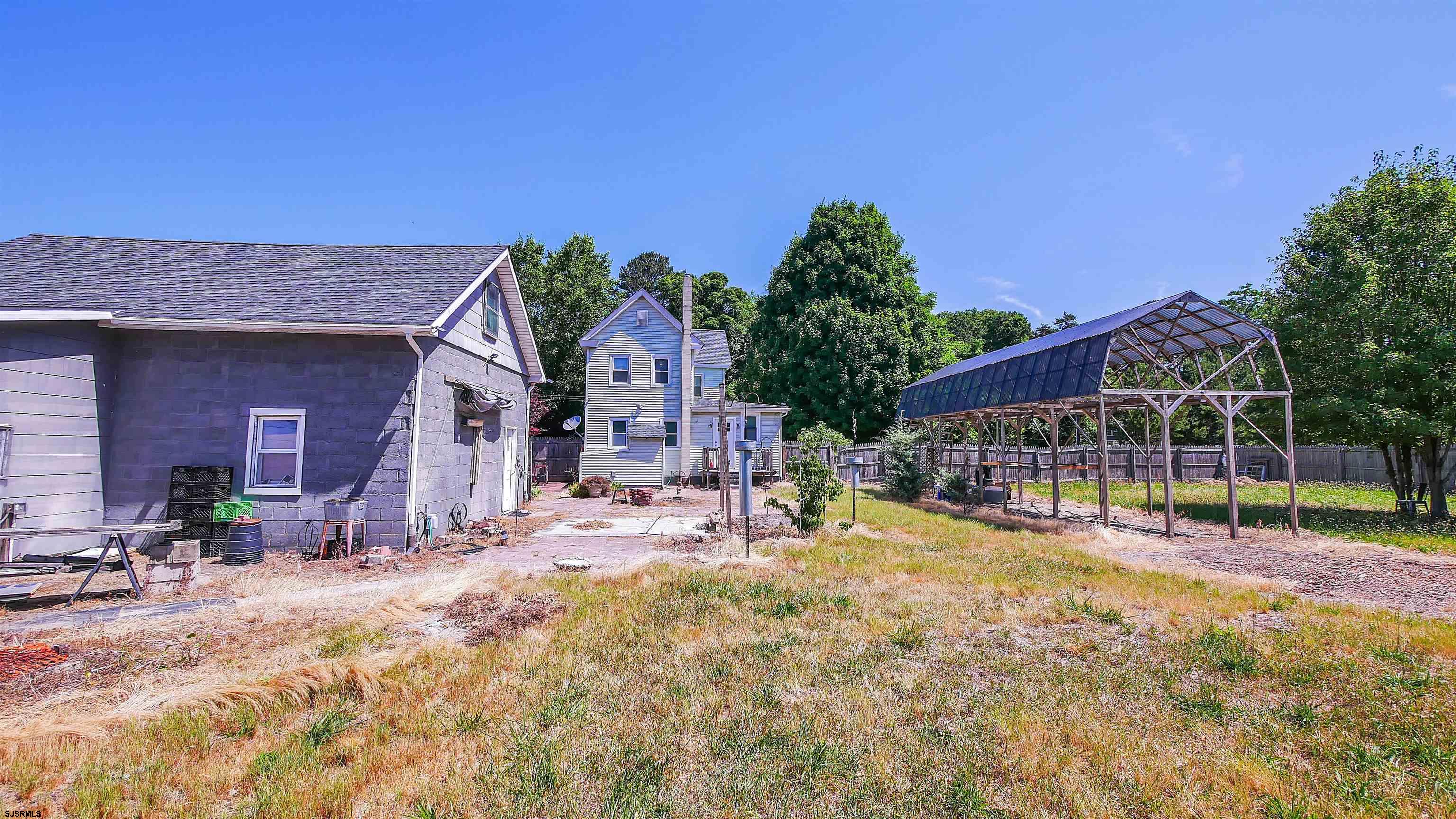 810 East Moss Mill Road Leeds Point, NJ 08205 - Photo 32 of 36 a view of a house with a yard and sitting area