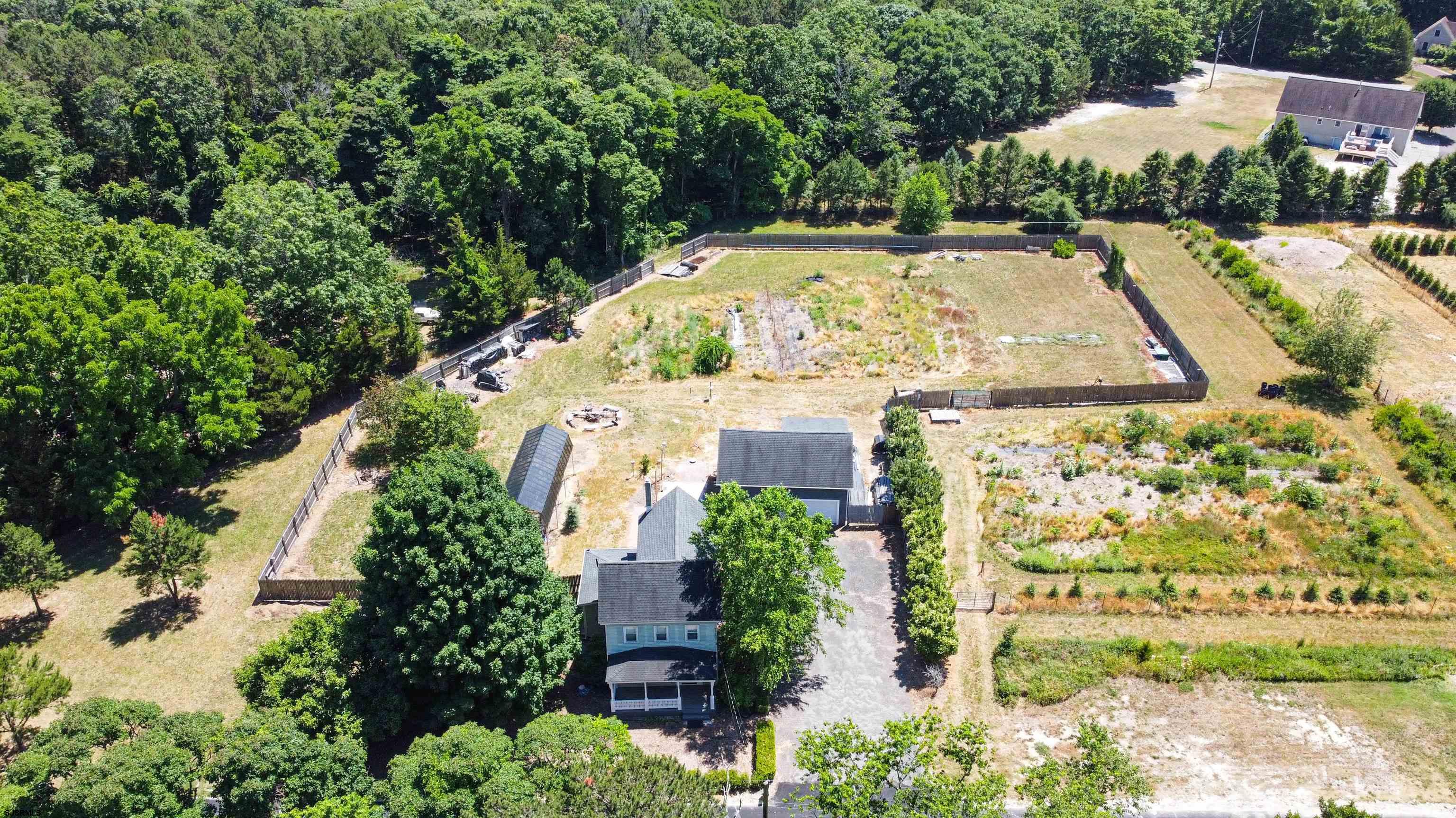 810 East Moss Mill Road Leeds Point, NJ 08205 - Photo 34 of 36 an aerial view of a house with a yard