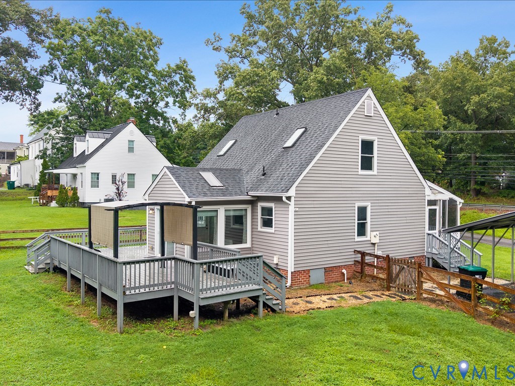 12230 Harrowgate Road Chester, VA 23831 - Photo 25 of 38 Rear exterior with a large multi-level deck, light