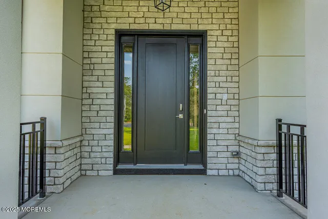a kitchen with stainless steel appliances a sink stove and cabinets