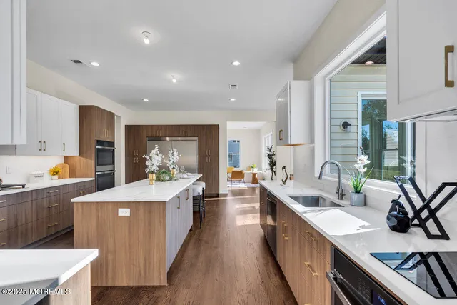 a living room with furniture or couch and a large window