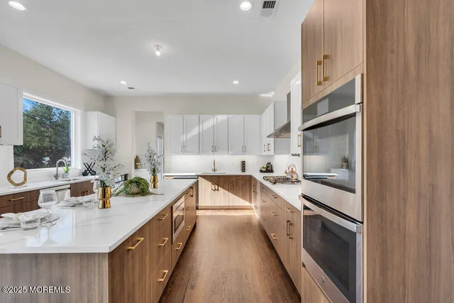 a bathroom with a toilet sink and shower