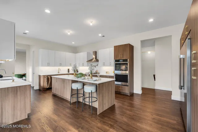 a view of an empty room and a window