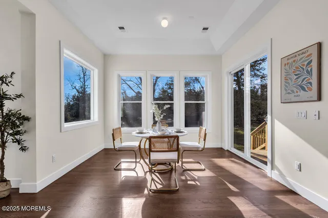 a view of a room with wooden walls