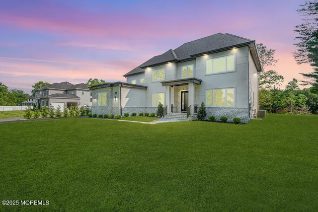 a view of a house with a big yard