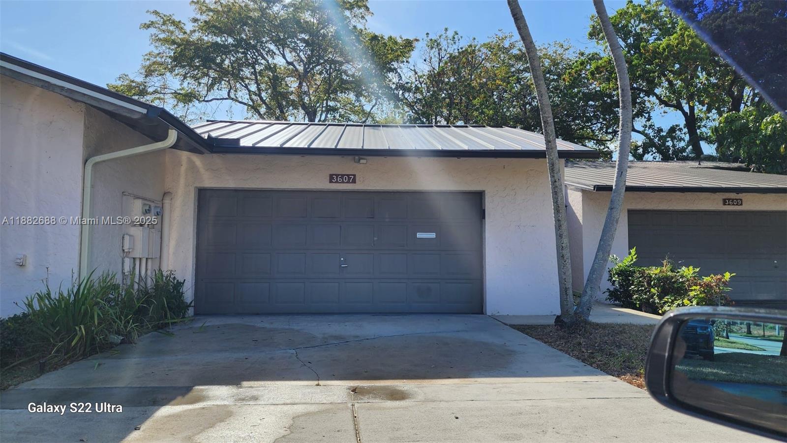 3607 Lime Hill Road, Unit 195 Lauderhill, FL 33319 - Photo 1 of 15 a front view of a house with a yard