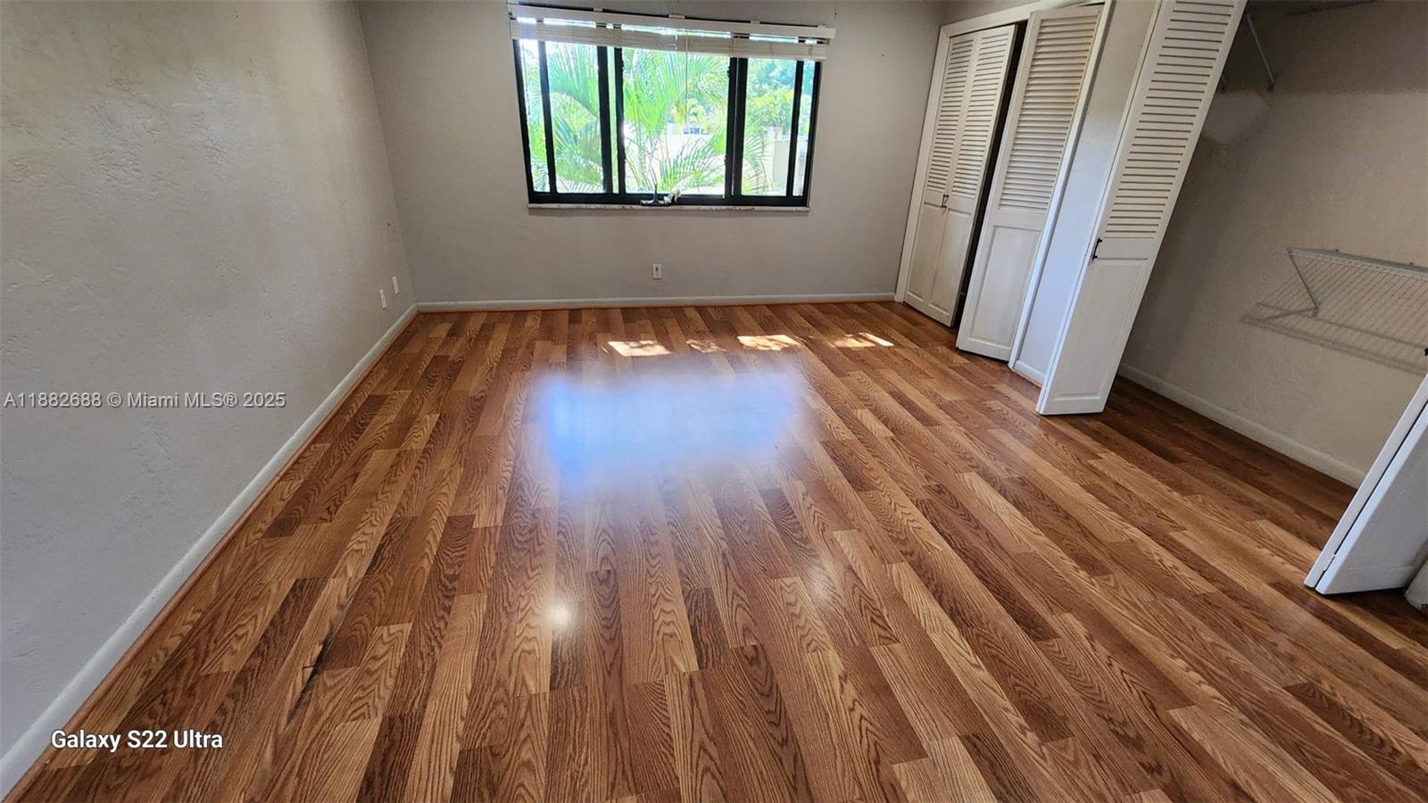 3607 Lime Hill Road, Unit 195 Lauderhill, FL 33319 - Photo 3 of 15 a view of a room with wooden floor and window