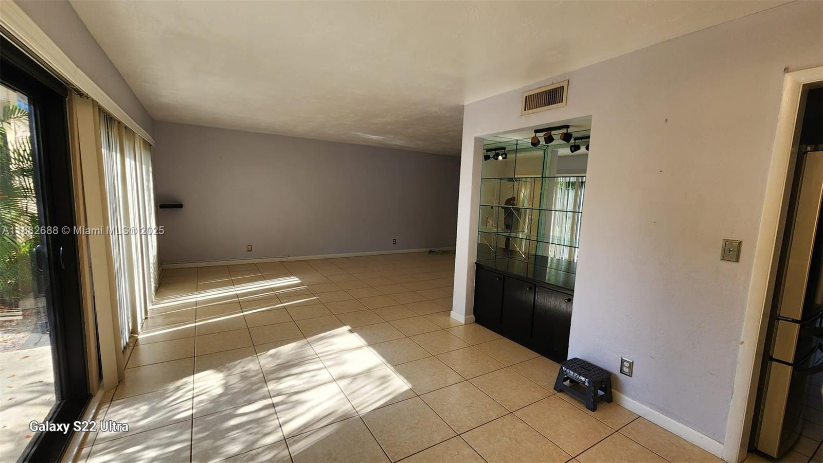 3607 Lime Hill Road, Unit 195 Lauderhill, FL 33319 - Photo 9 of 15 a view of walk in closet with empty racks