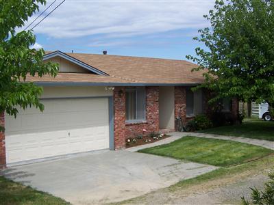 4785 Esquivel Road Vacaville, CA 95688 - Photo 1 of 12 Front of home has new sod and remote control gate.