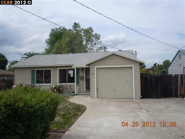a view of a house with a garage