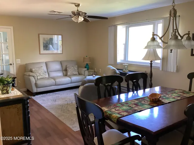 a view of a dining room with furniture