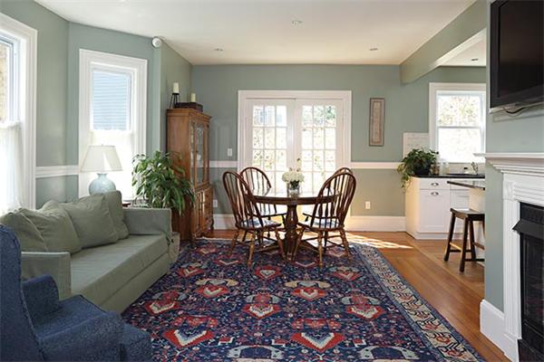 10 Milton Road Brookline, MA 02445 - Photo 2 of 7 a living room with furniture fireplace and a flat screen tv