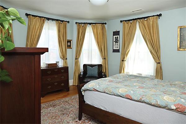 10 Milton Road Brookline, MA 02445 - Photo 5 of 7 a bedroom with a bed and window