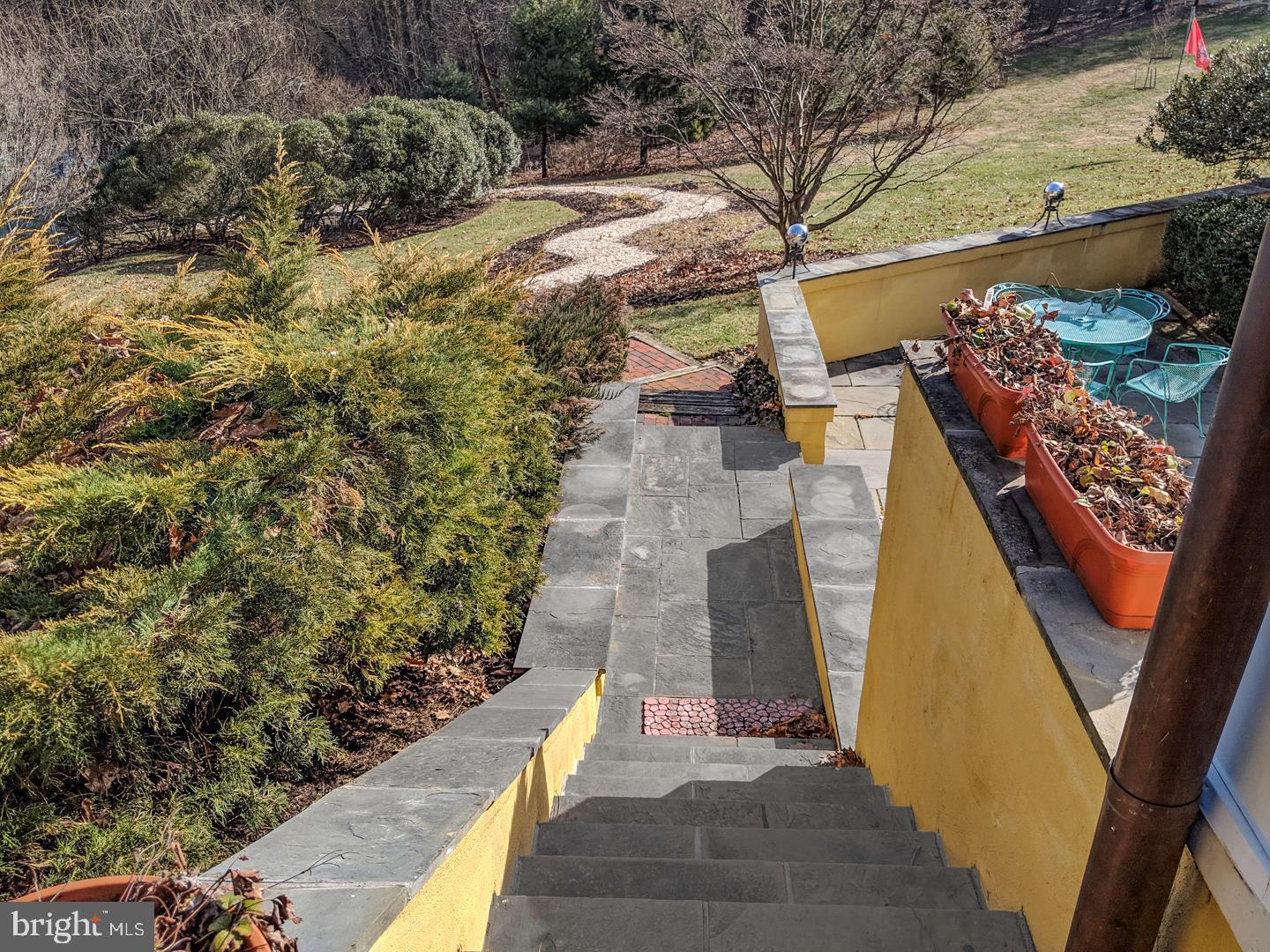 656 St Matthews Road Chester Springs, PA 19425 - Photo 11 of 66 Stairs from the Solarium Terrace to Courtyard
