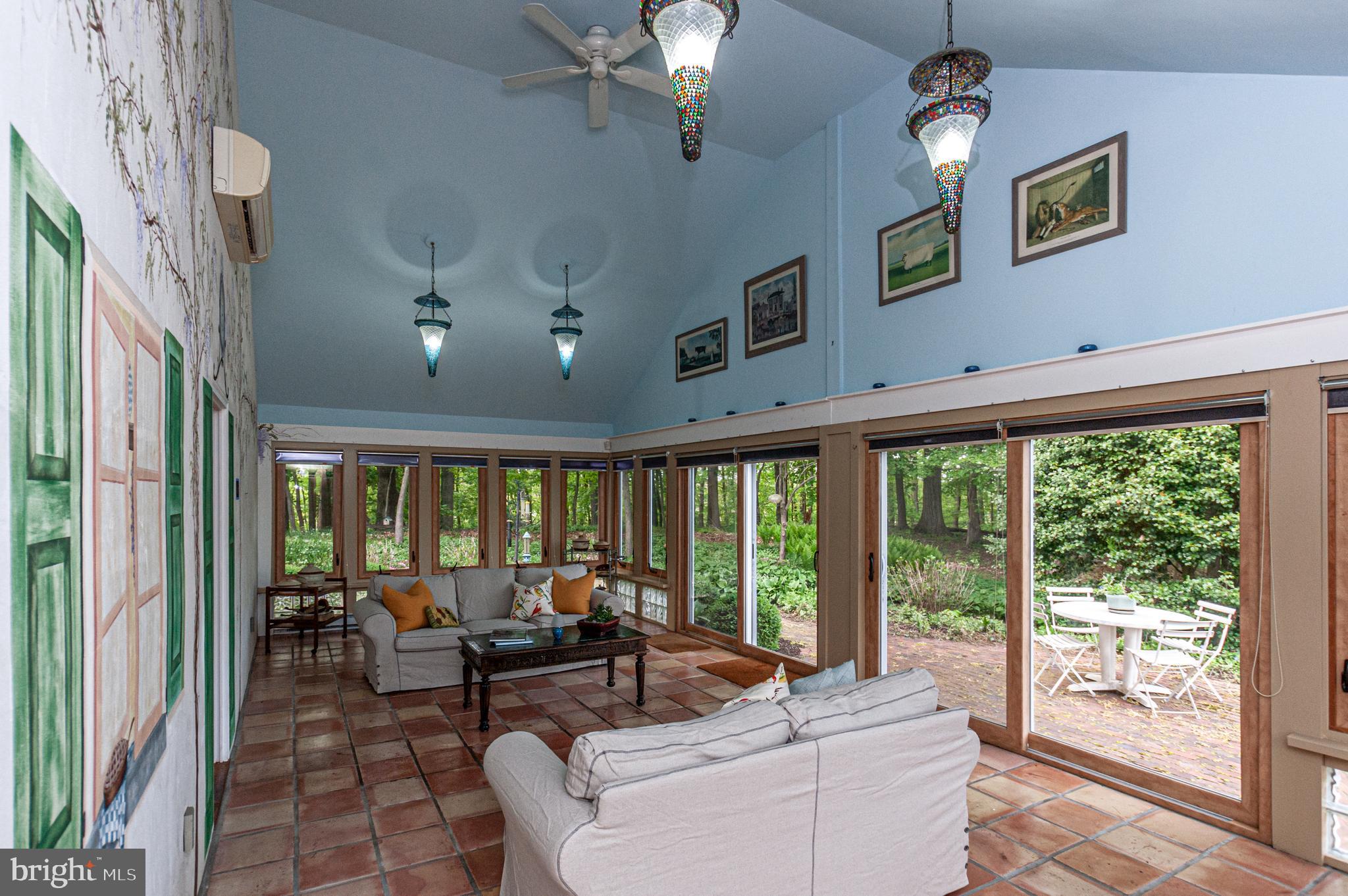 656 St Matthews Road Chester Springs, PA 19425 - Photo 33 of 66 Solarium with tile floor and vaulted ceiling