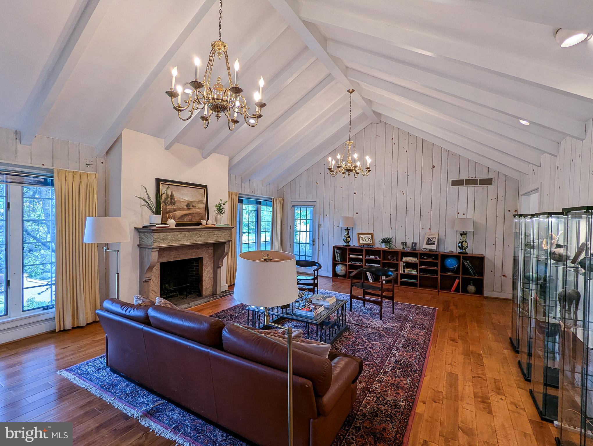 656 St Matthews Road Chester Springs, PA 19425 - Photo 36 of 66 Living Room w/ vaulted ceiling and fireplace.