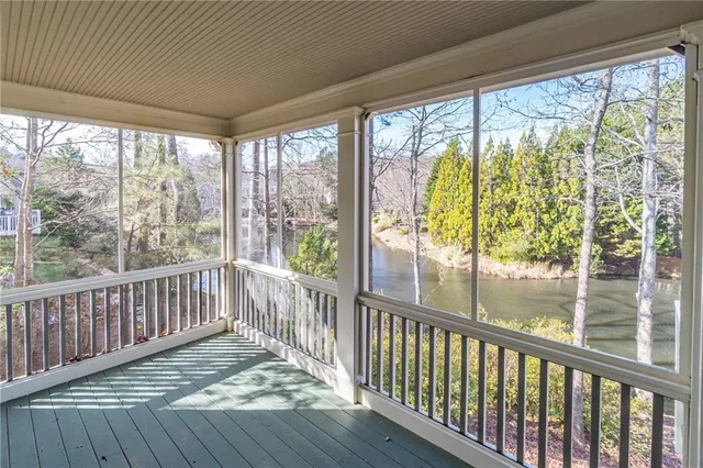 a view of balcony with wooden floor