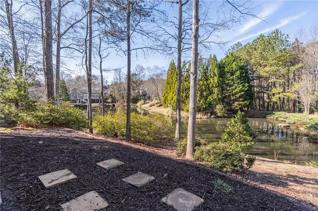 a backyard of a house with lots of green space