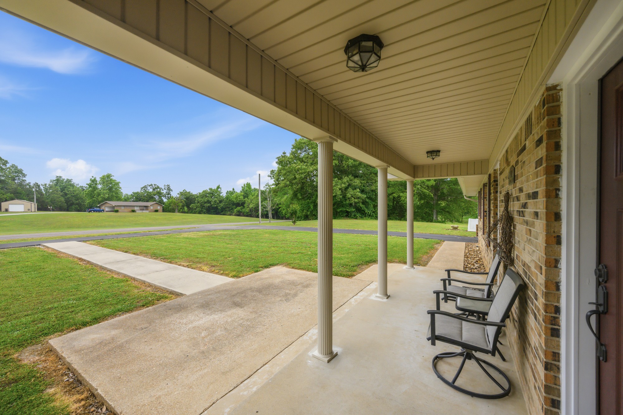 944 Brooksie Thompson Road Decaturville, TN 38329 - Photo 31 of 47 a view of a patio with a backyard