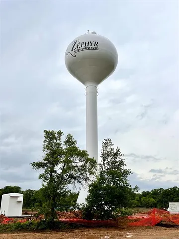 a sign board with a yard