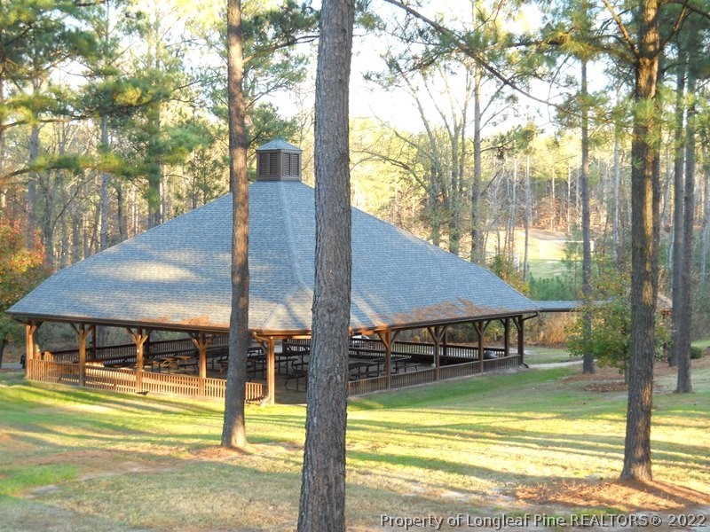 208 School Side Drive Spring Lake, NC 28390 - Photo 2 of 7 a view of a swimming pool with sitting area and furniture