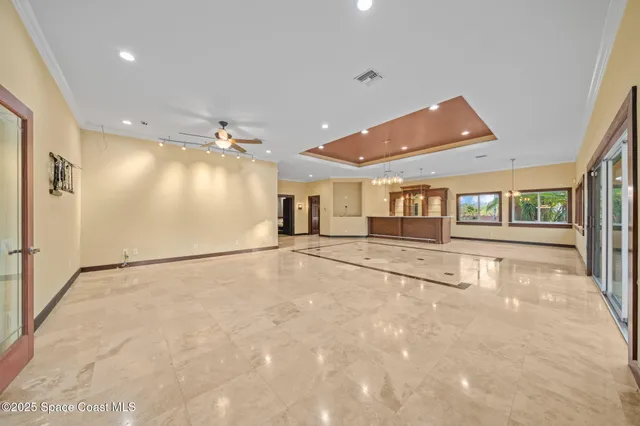 a view of swimming pool with outdoor seating