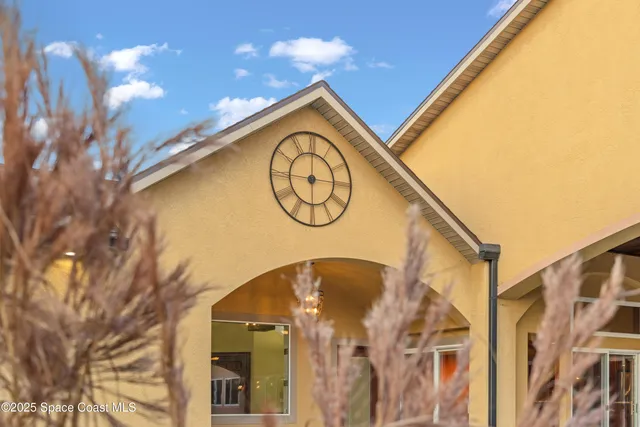a view of an entryway with a chandelier