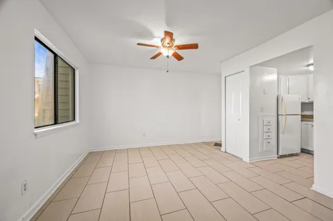 a view of an empty room and window