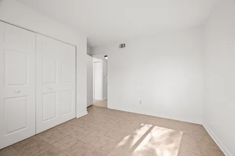 a view of a bathroom from a hallway