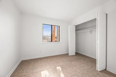 a view of a bathroom from a corridor
