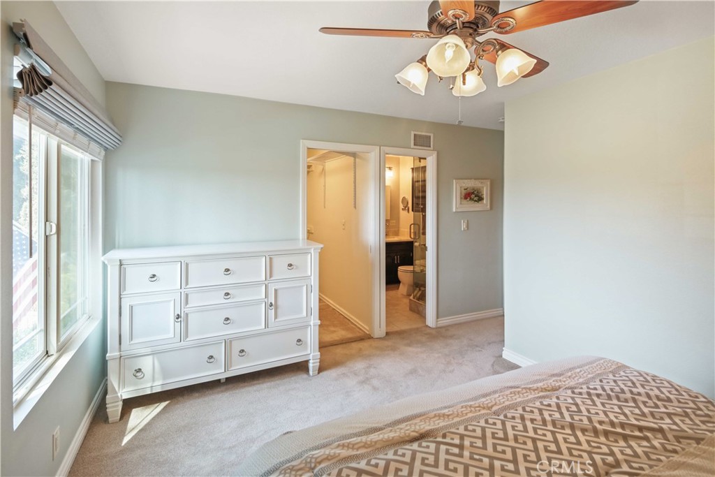 18836 Cedar Valley Way Newhall, CA 91321 - Photo 35 of 48 wooden floor in an empty room with a window