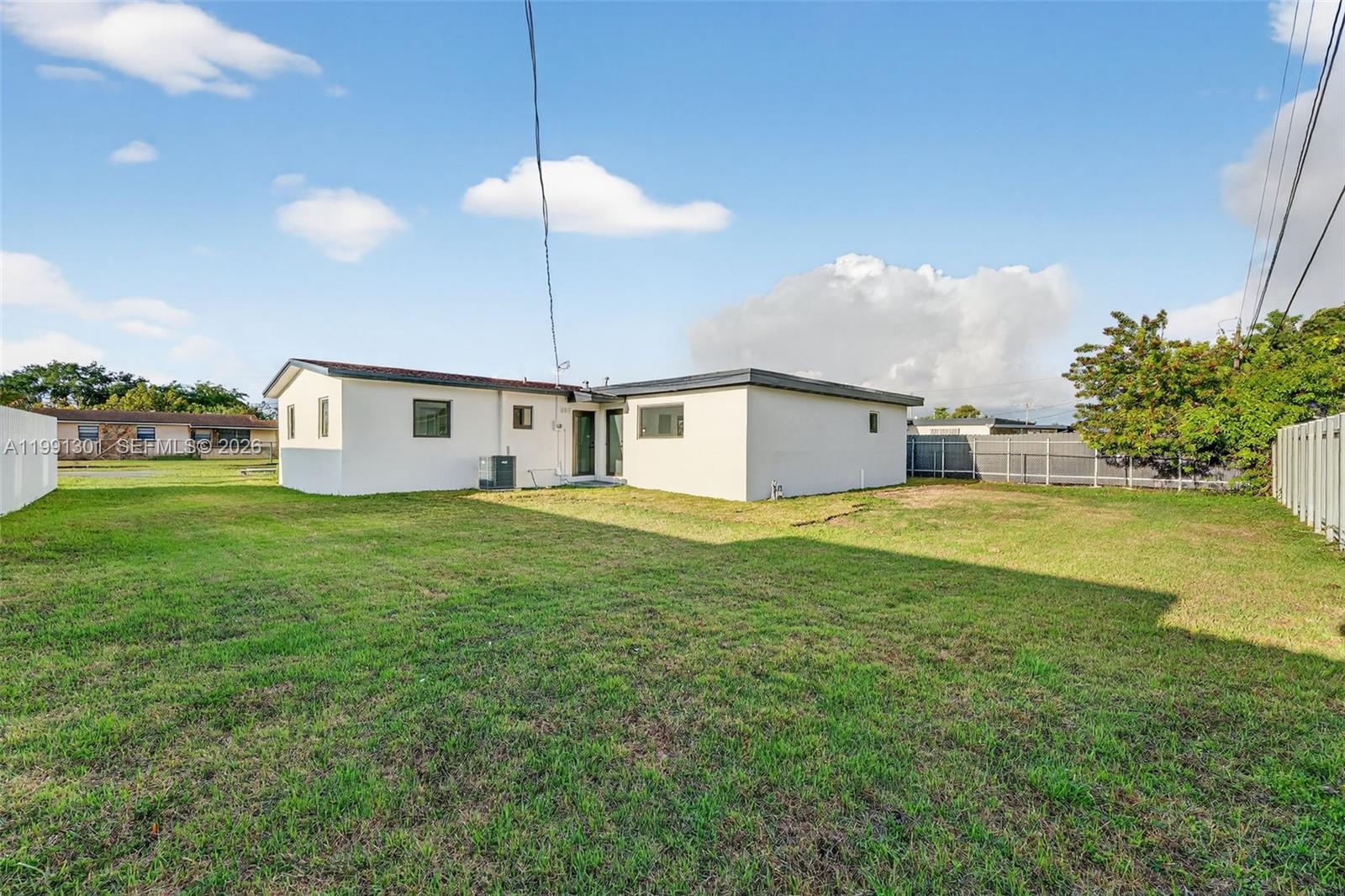 10445 Southwest 149th Terrace Miami, FL 33176 - Photo 19 of 19 a house view with a outdoor space