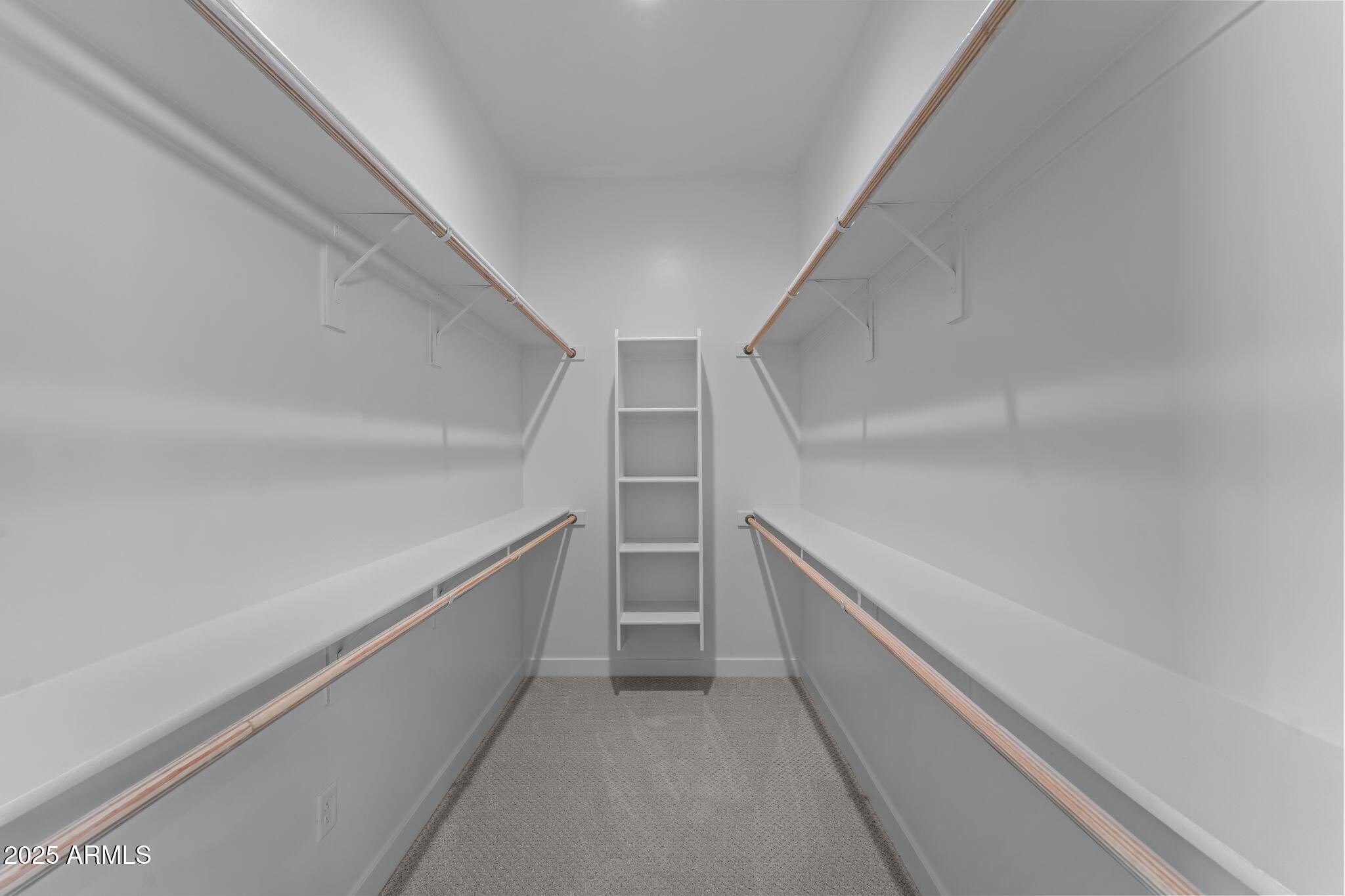 23012 Peak View Road Wittmann, AZ 85361 - Photo 22 of 44 a view of an empty walk in closet