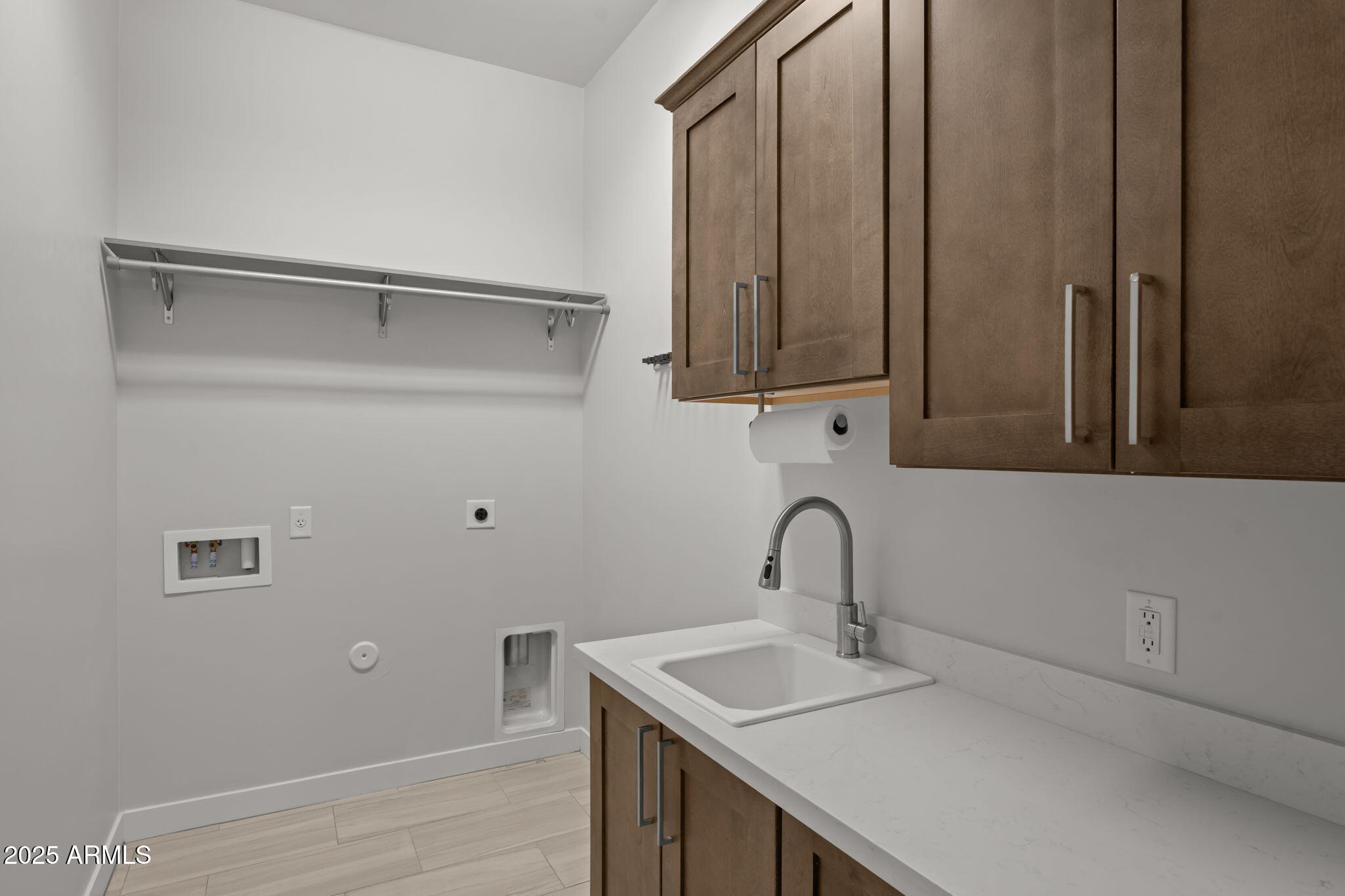 23012 Peak View Road Wittmann, AZ 85361 - Photo 28 of 44 a bathroom with a sink and a mirror
