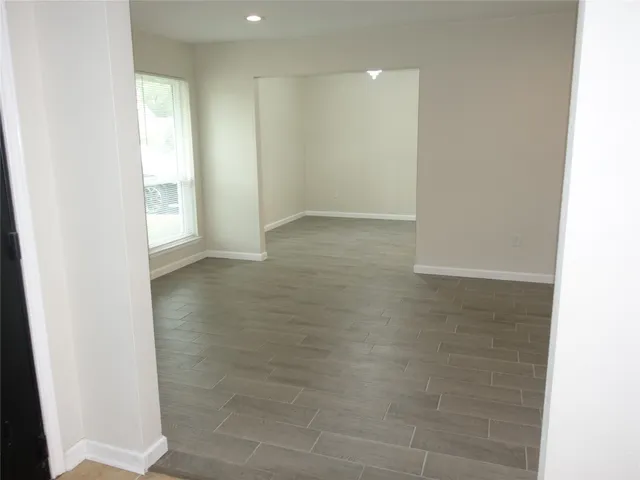 a view of kitchen and kitchen with a sink