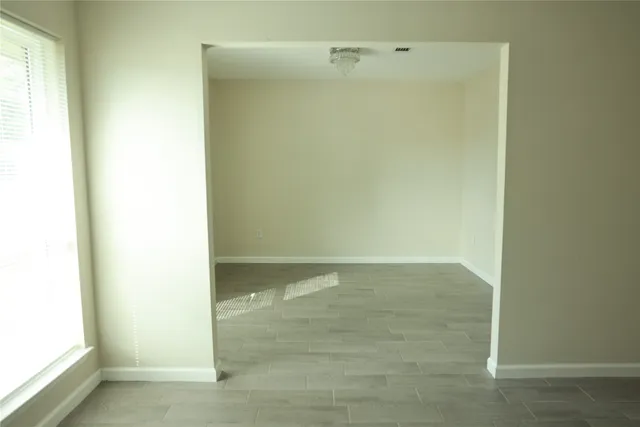 an empty room with a window