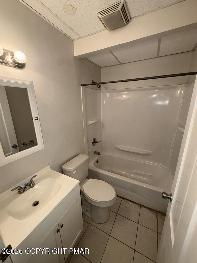 532 Cherry Street, Unit A Scranton, PA 18505 - Photo 15 of 23 a bathroom with a sink a toilet and shower