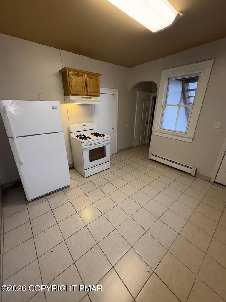 532 Cherry Street, Unit A Scranton, PA 18505 - Photo 3 of 23 a kitchen with stainless steel appliances granite countertop a stove a sink and a refrigerator