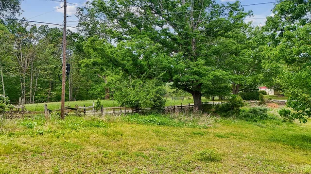 a fire hydrant in the middle of a field