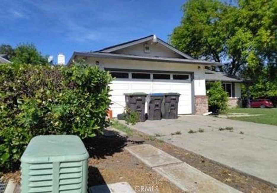 7143 Shoreham Place Stockton, CA 95207 - Photo 2 of 7 a front view of a house with a yard