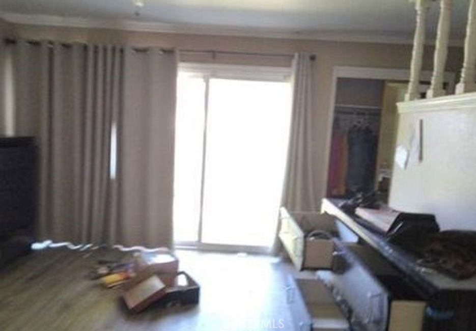 7143 Shoreham Place Stockton, CA 95207 - Photo 6 of 7 a bedroom with a bed and a window