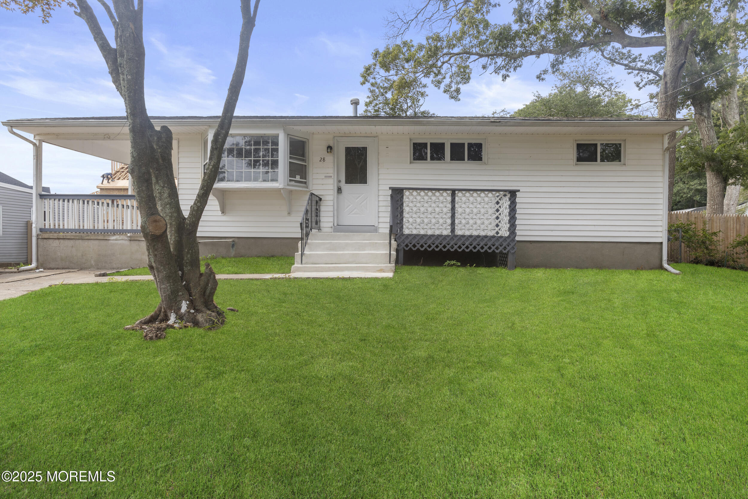 a front view of house with yard