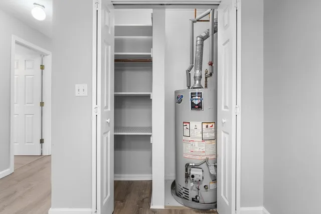 a view of a hallway with shelves