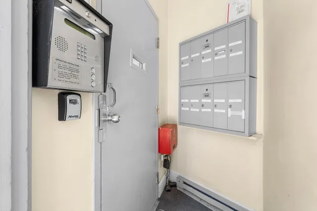 a view of a car parked in front of a building