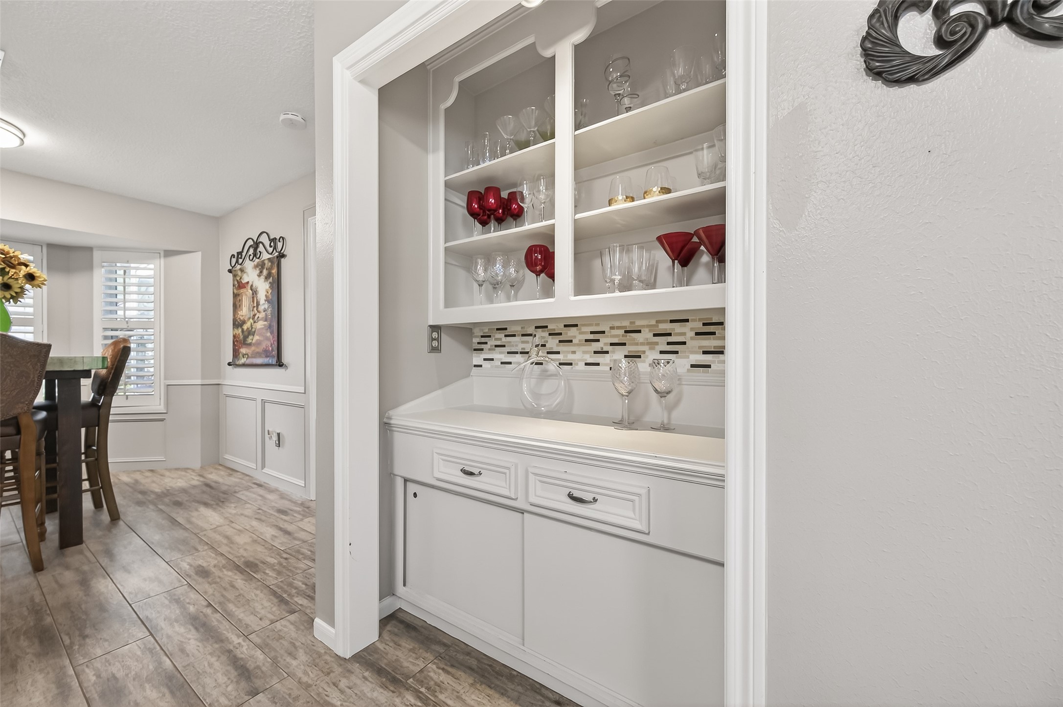 7310 Maidstone Lane Houston, TX 77095 - Photo 12 of 40 Pretty built-in shelves and cabinets for extra kitchen storage.