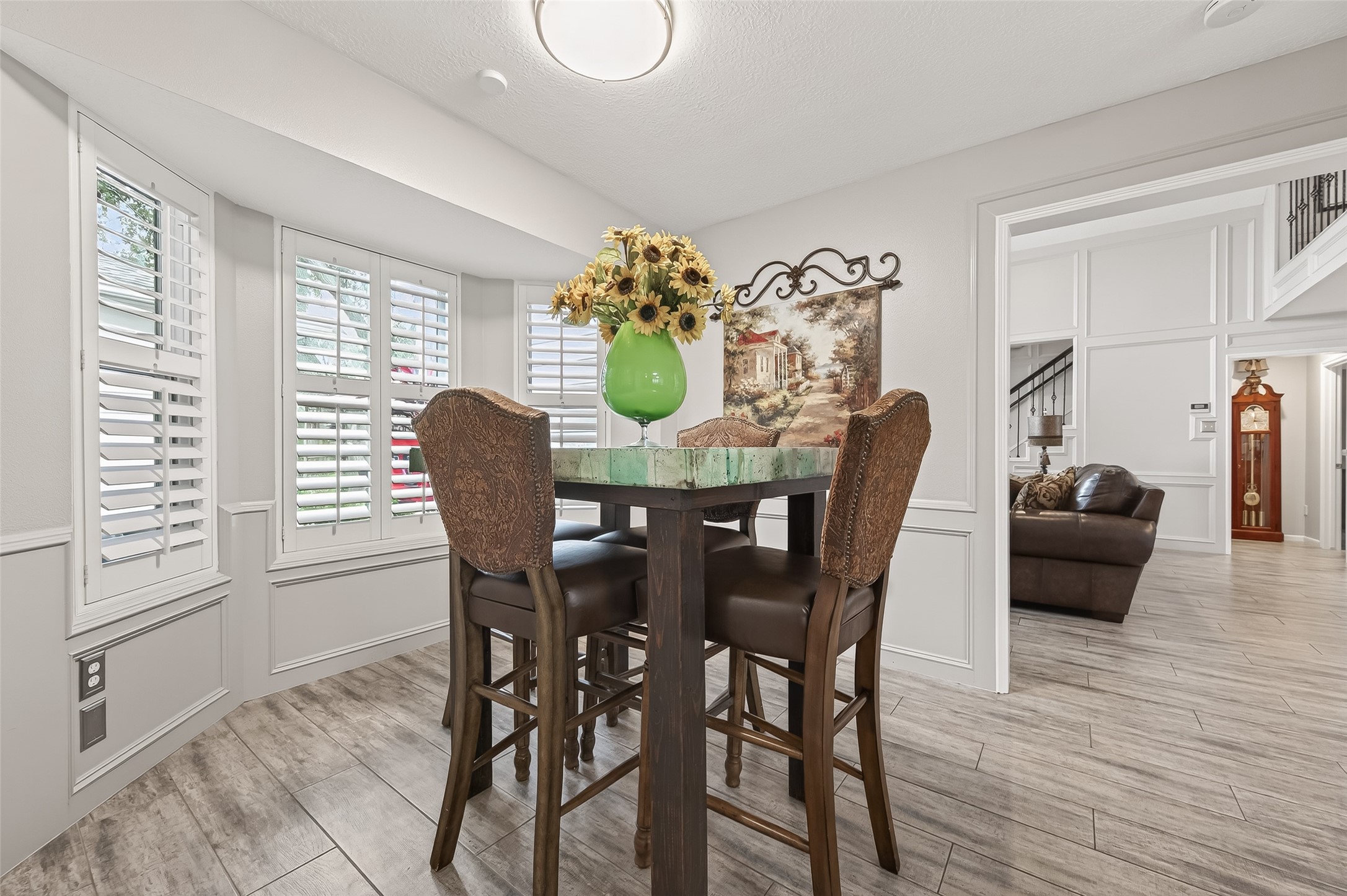 7310 Maidstone Lane Houston, TX 77095 - Photo 13 of 40 The breakfast room is just off of the kitchen. Beautiful wall molding throughout the downstairs common areas.